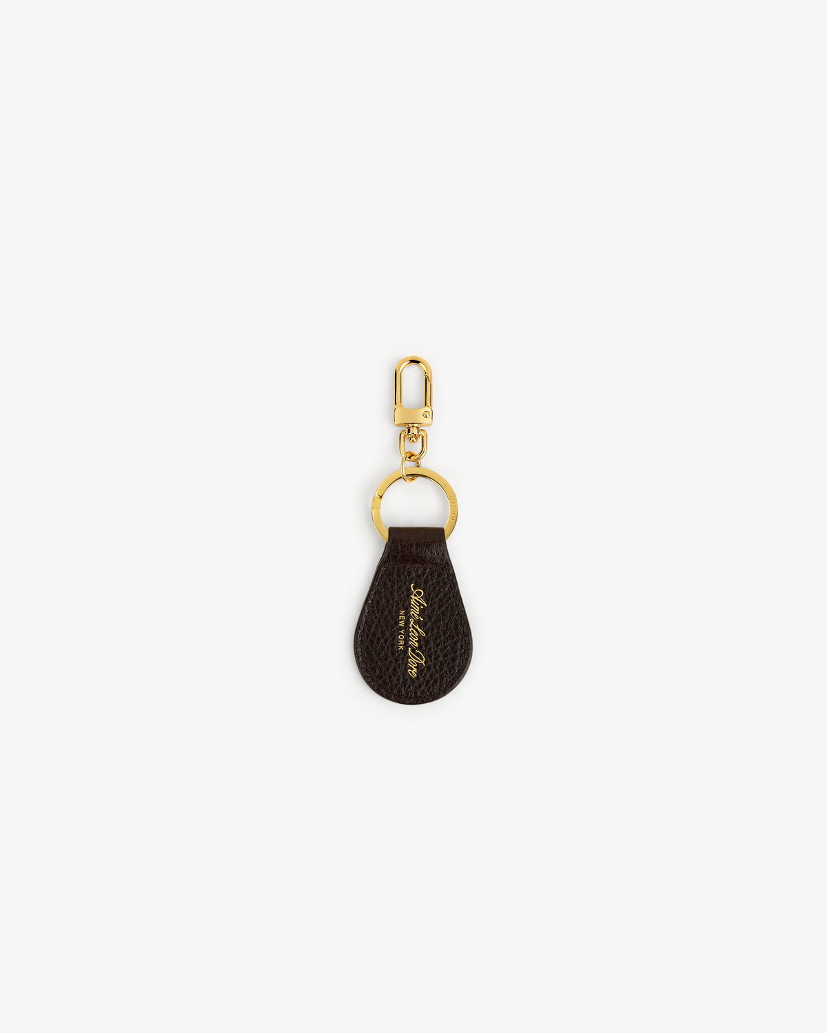 Tumbled Leather Key Fob in brown with gold hardware and cursive text, shown on a white background.