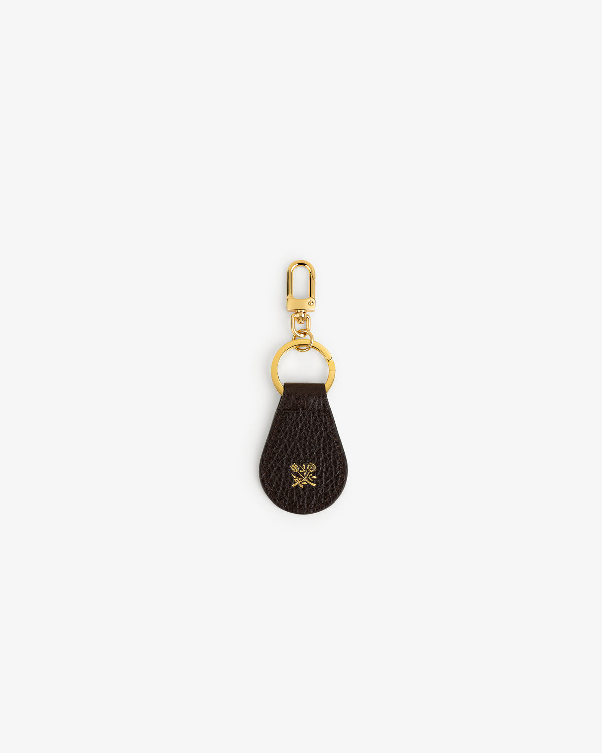 Tumbled Leather Key Fob: dark brown leather, gold clip & keyring, gold floral emblem on the leather.