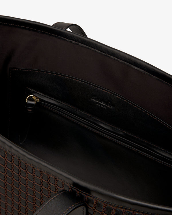 Interior view of a dark Woven Leather Tote Bag showing a zippered pocket.