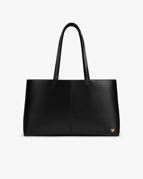 Napa Leather Shoulder Bag in black with two shoulder straps and a small gold emblem on the front corner.
