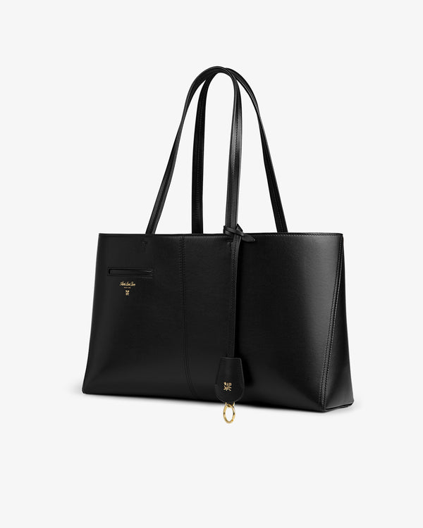 Napa Leather Shoulder Bag in black leather with double straps and a gold charm.