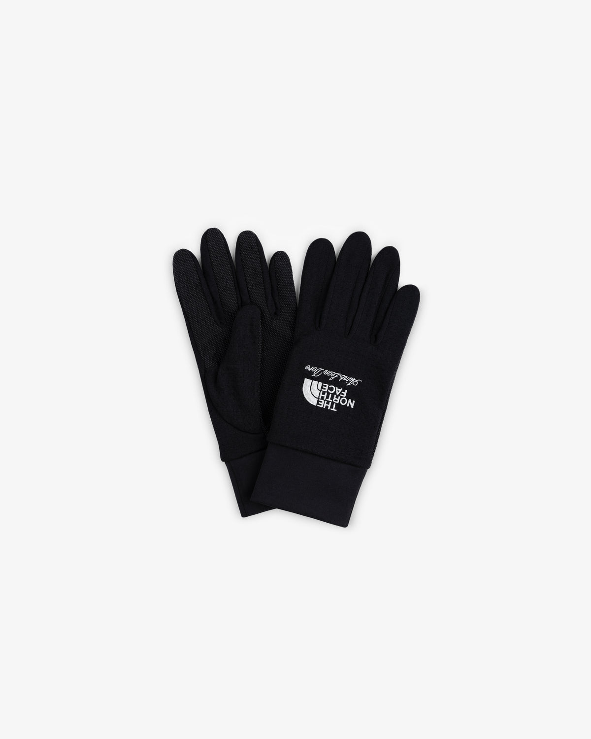 ALD / The North Face DOTKNIT™ Liner Gloves in black with white logo, stacked on a white background.