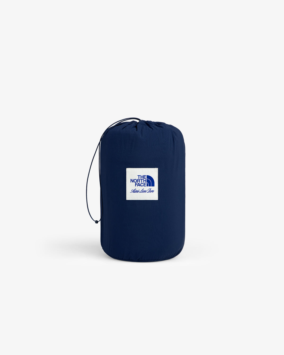 A blue ALD / The North Face Packable Fleece Blanket, drawstring sack and logo patch on a plain white background.