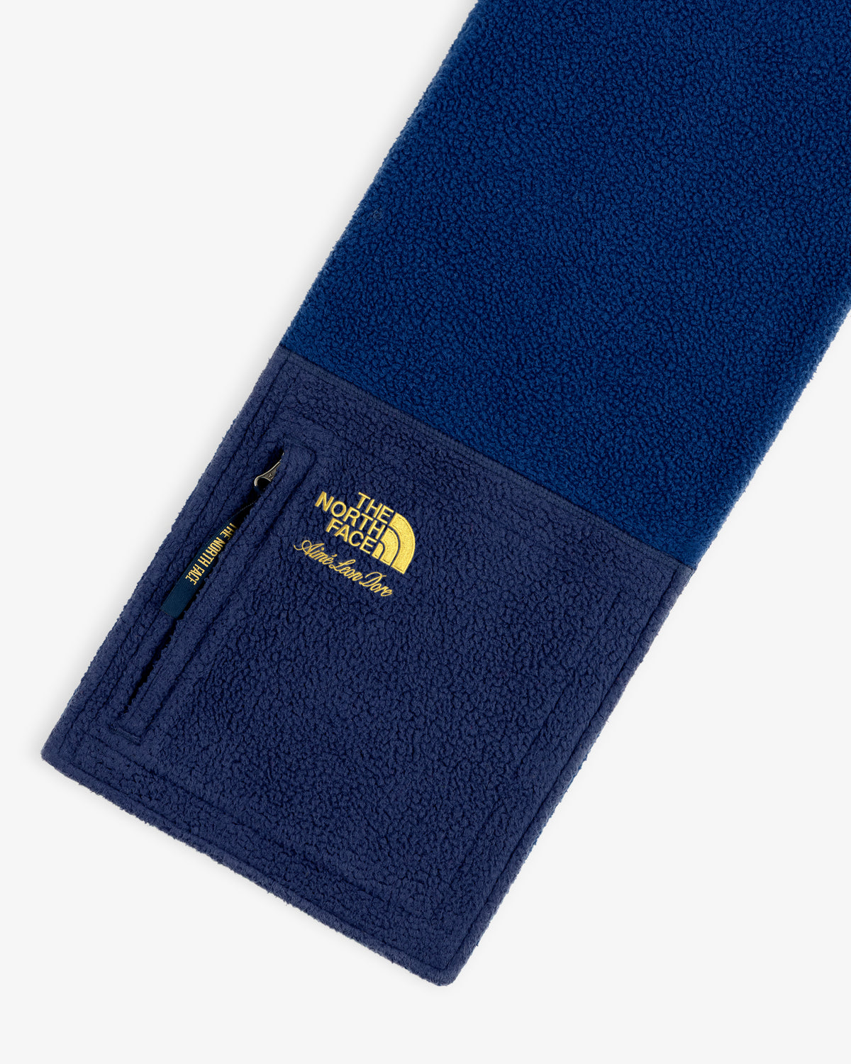 Blue ALD/The North Face Denali Fleece Scarf with a small zip pocket and yellow embroidered logo.