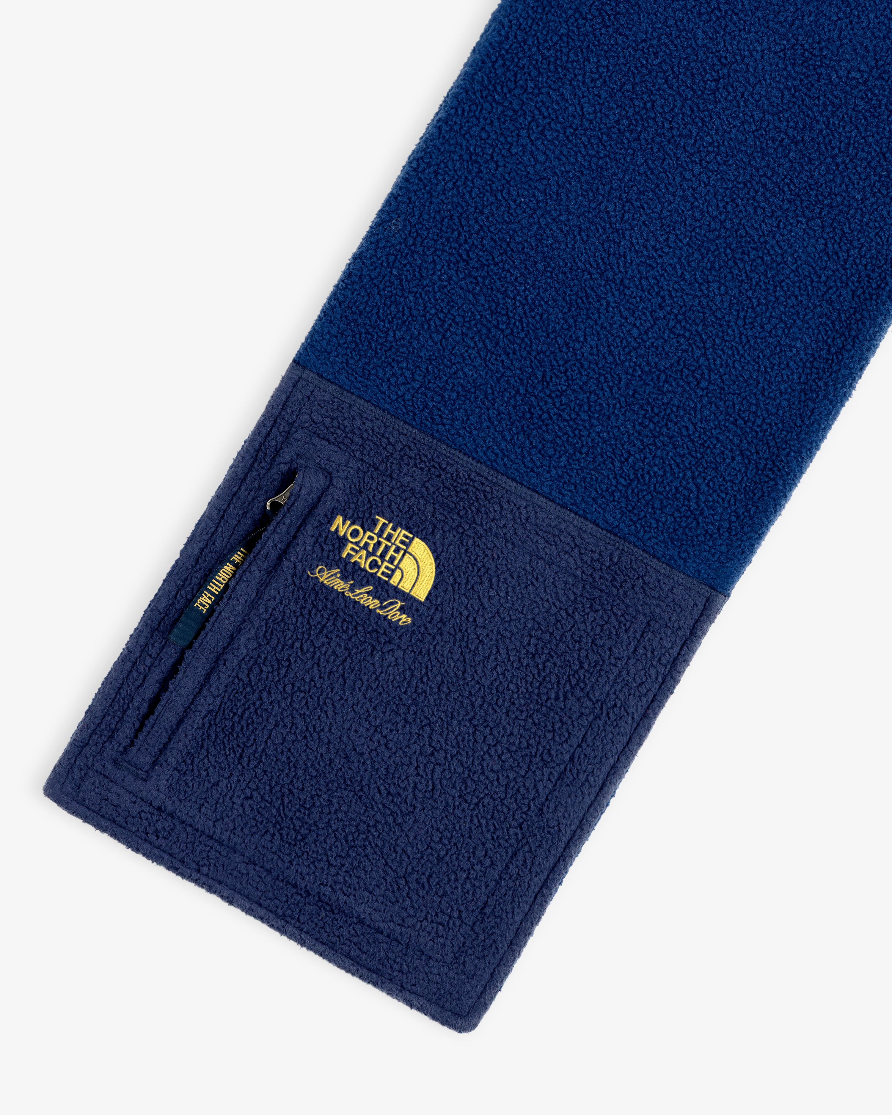Blue ALD/The North Face Denali Fleece Scarf with a small zip pocket and yellow embroidered logo.