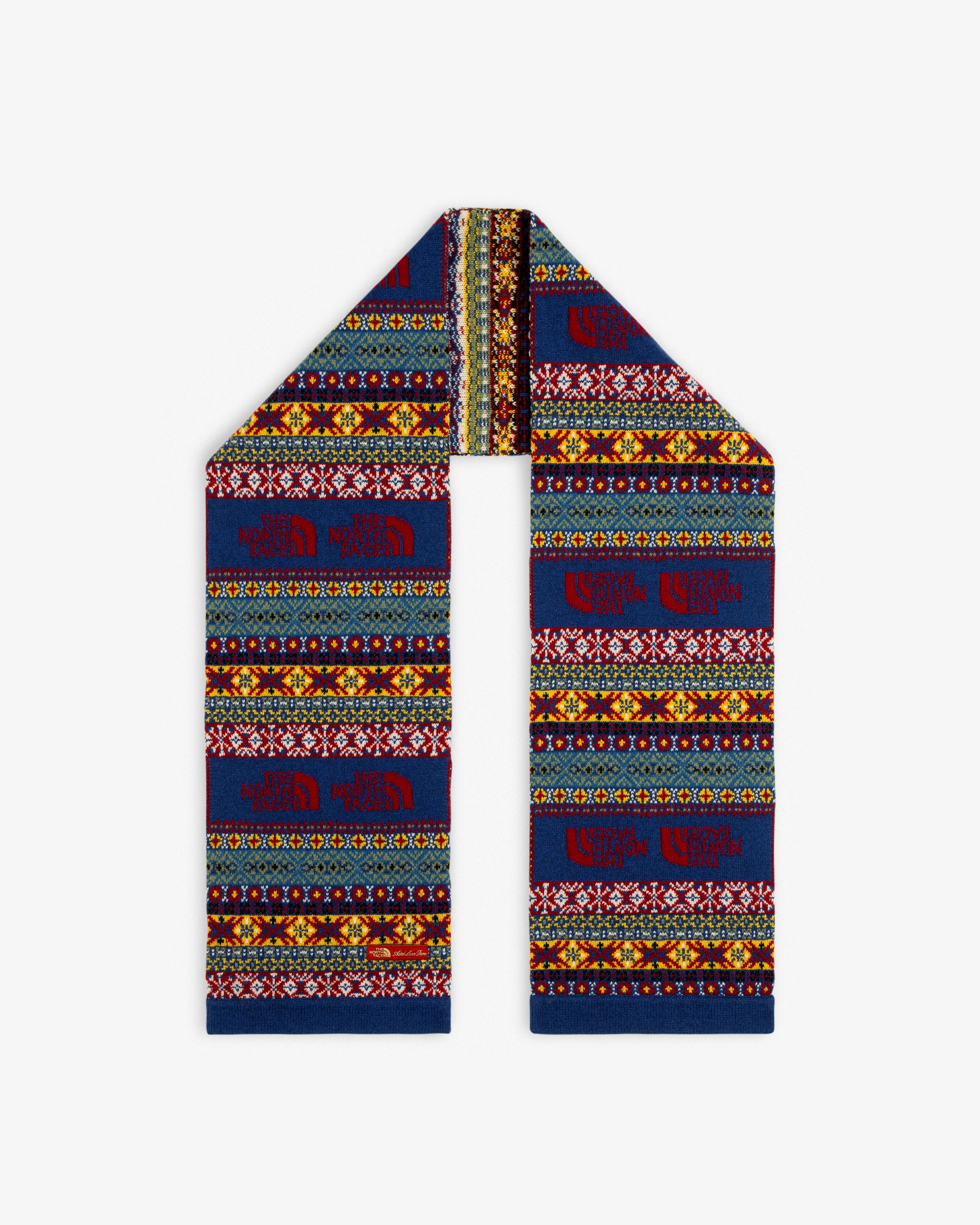 ALD / The North Face Fair Isle Scarf: Knit with blue, red, yellow, and white geometric and snowflake patterns.