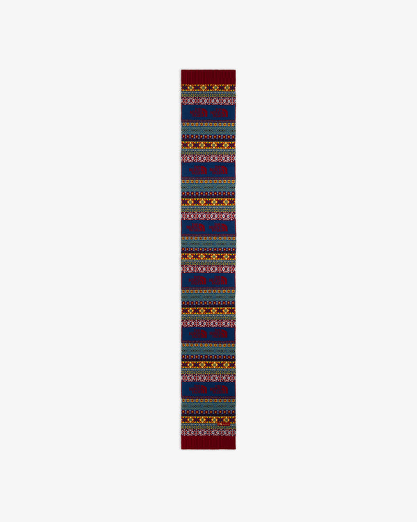 ALD / The North Face Fair Isle Scarf in blue with red mountain logos and yellow geometric borders.