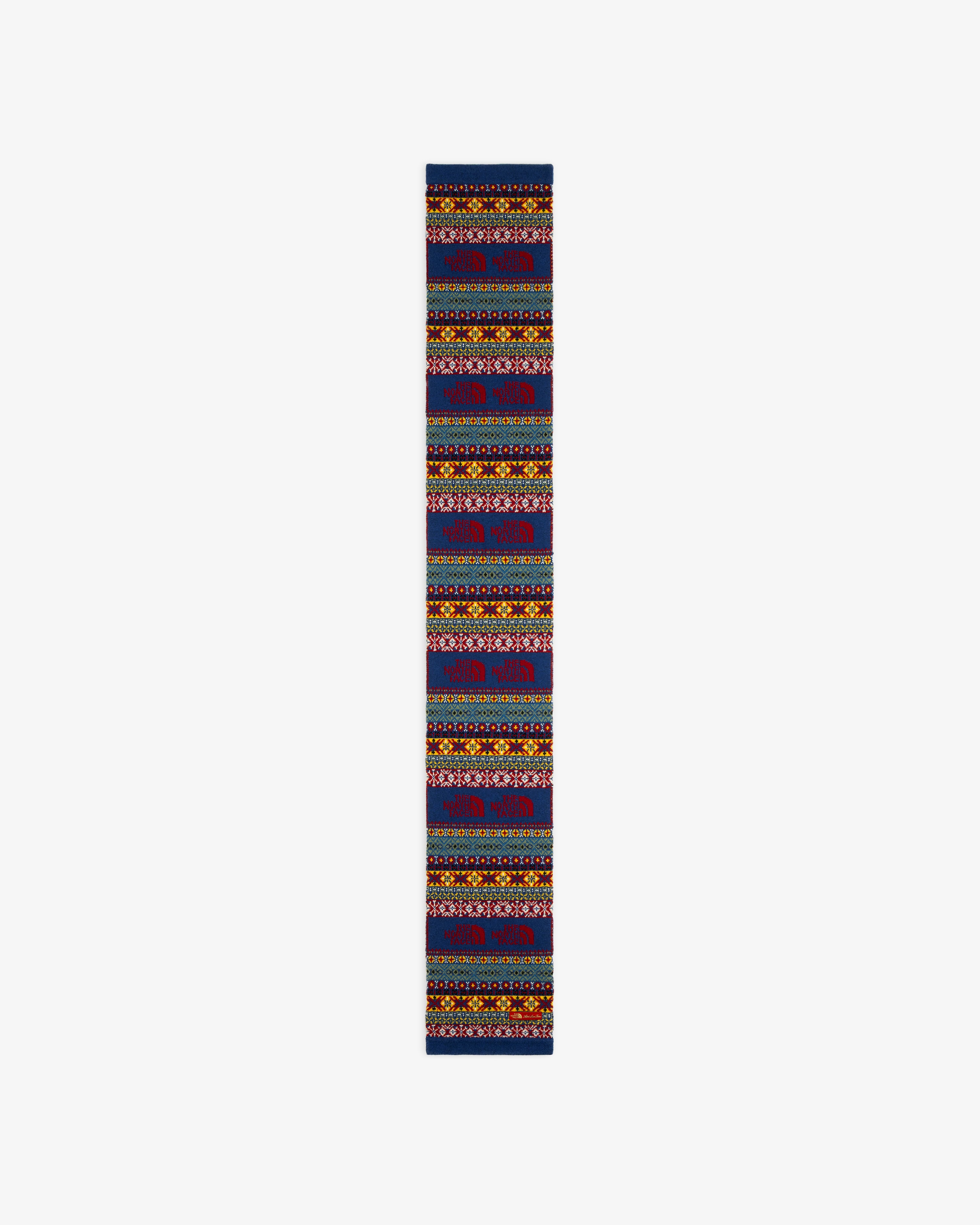 ALD/The North Face Fair Isle Scarf: vibrant geometric patterns in red, blue, yellow & green on white background.