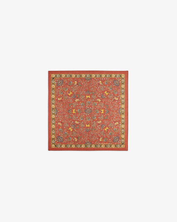 Archival Print Wool Silk Bandana featuring red, yellow, and blue florals with a gold and black border.