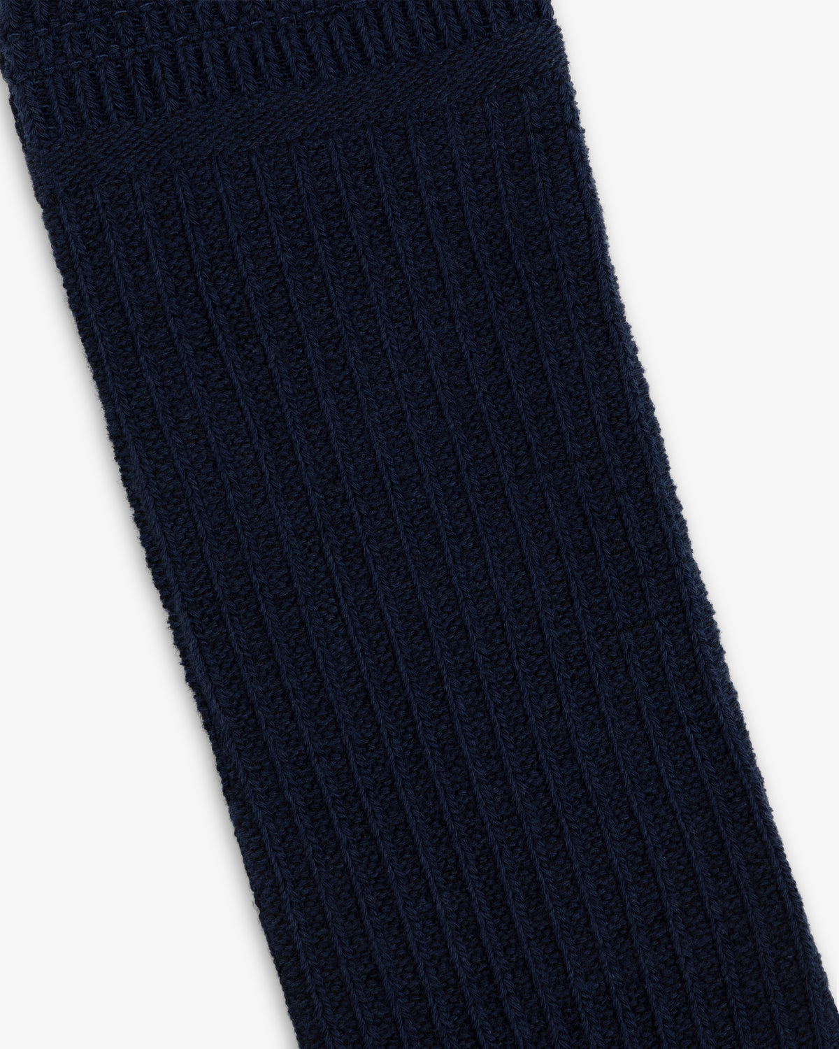A dark blue Cotton Waffle Sock with a ribbed knit texture.