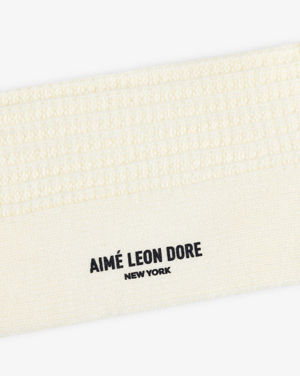 Off-white ribbed Cotton Waffle Sock with Aimé Leon Dore New York printed in black.