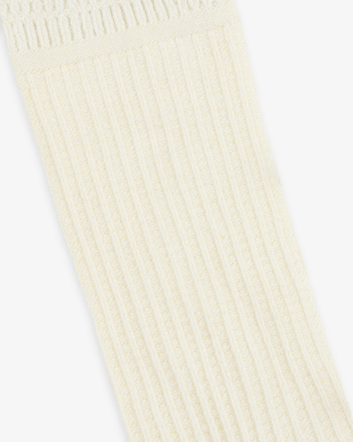 Off-white Cotton Waffle Sock with a vertical ribbed texture and a waffle-knit cuff.