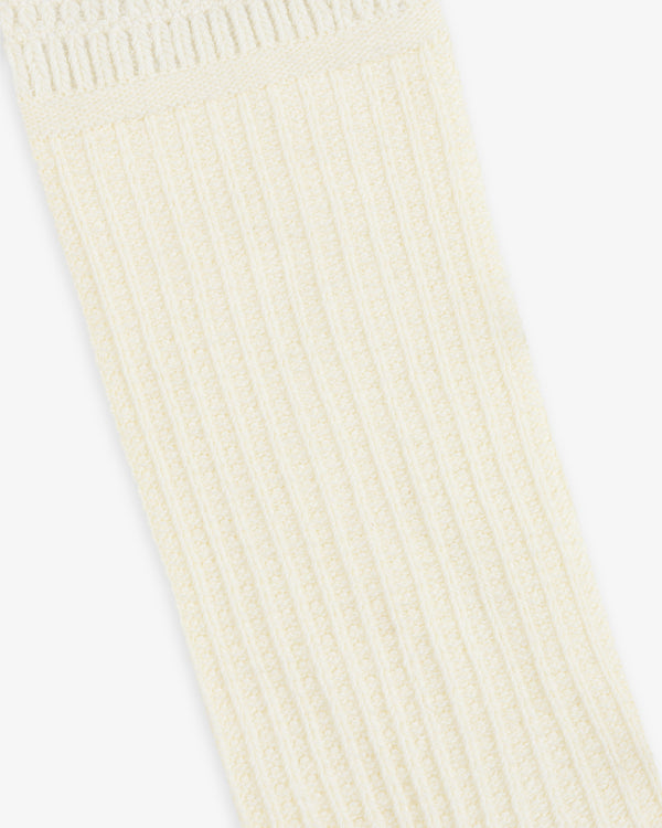 Off-white Cotton Waffle Sock with a vertical ribbed texture and a waffle-knit cuff.