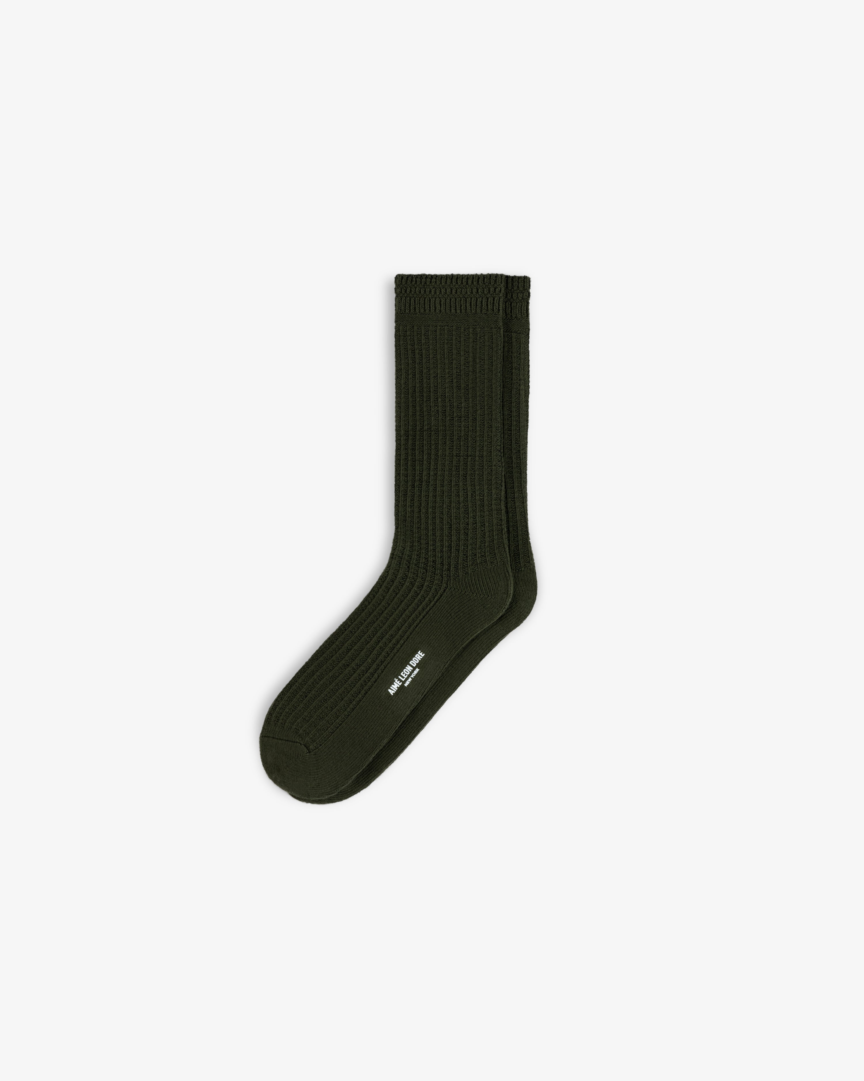 Dark olive green Cotton Waffle Sock with a textured waffle knit pattern and a small white brand logo on the side.