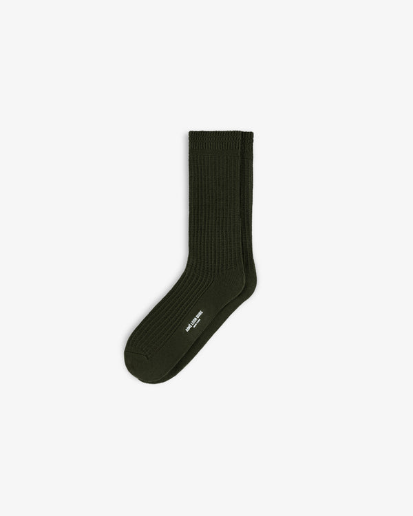 Dark olive green Cotton Waffle Sock with a textured waffle knit pattern and a small white brand logo on the side.