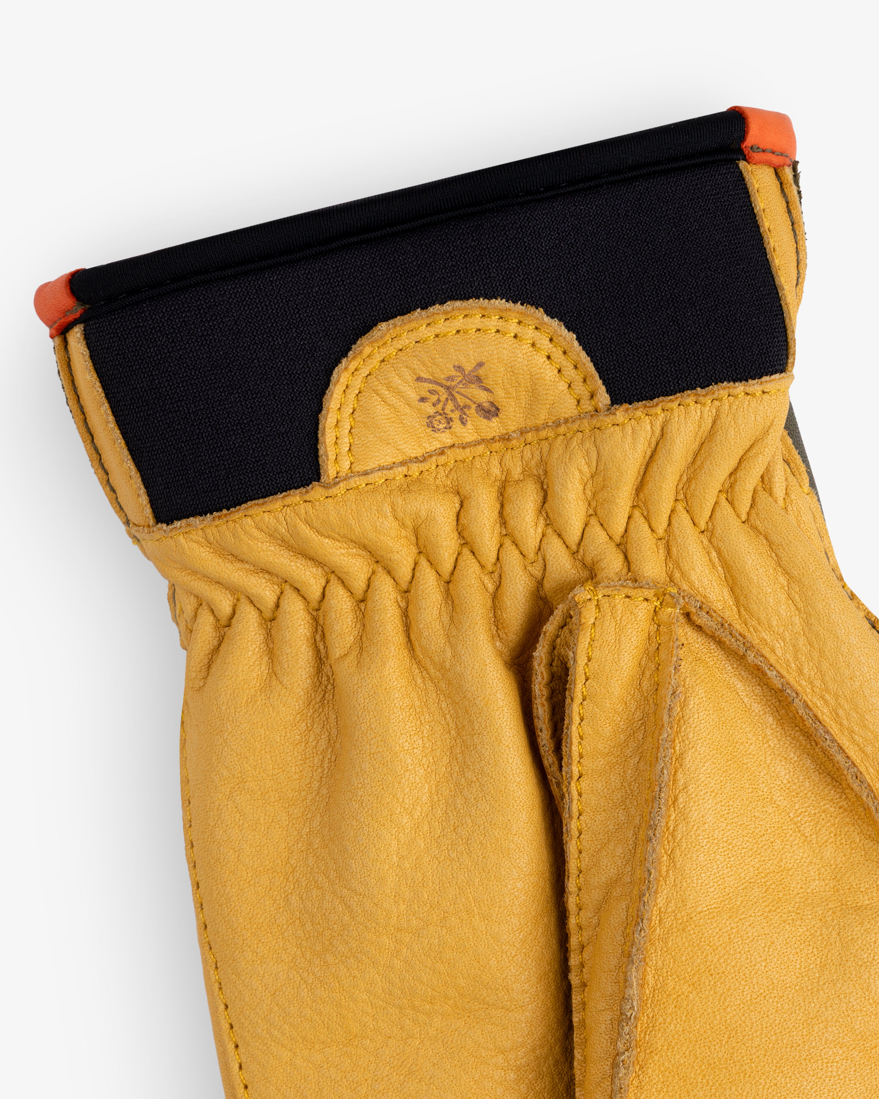 Yellow leather Wakayama Gloves with a black elastic cuff and an embossed logo on the wrist.