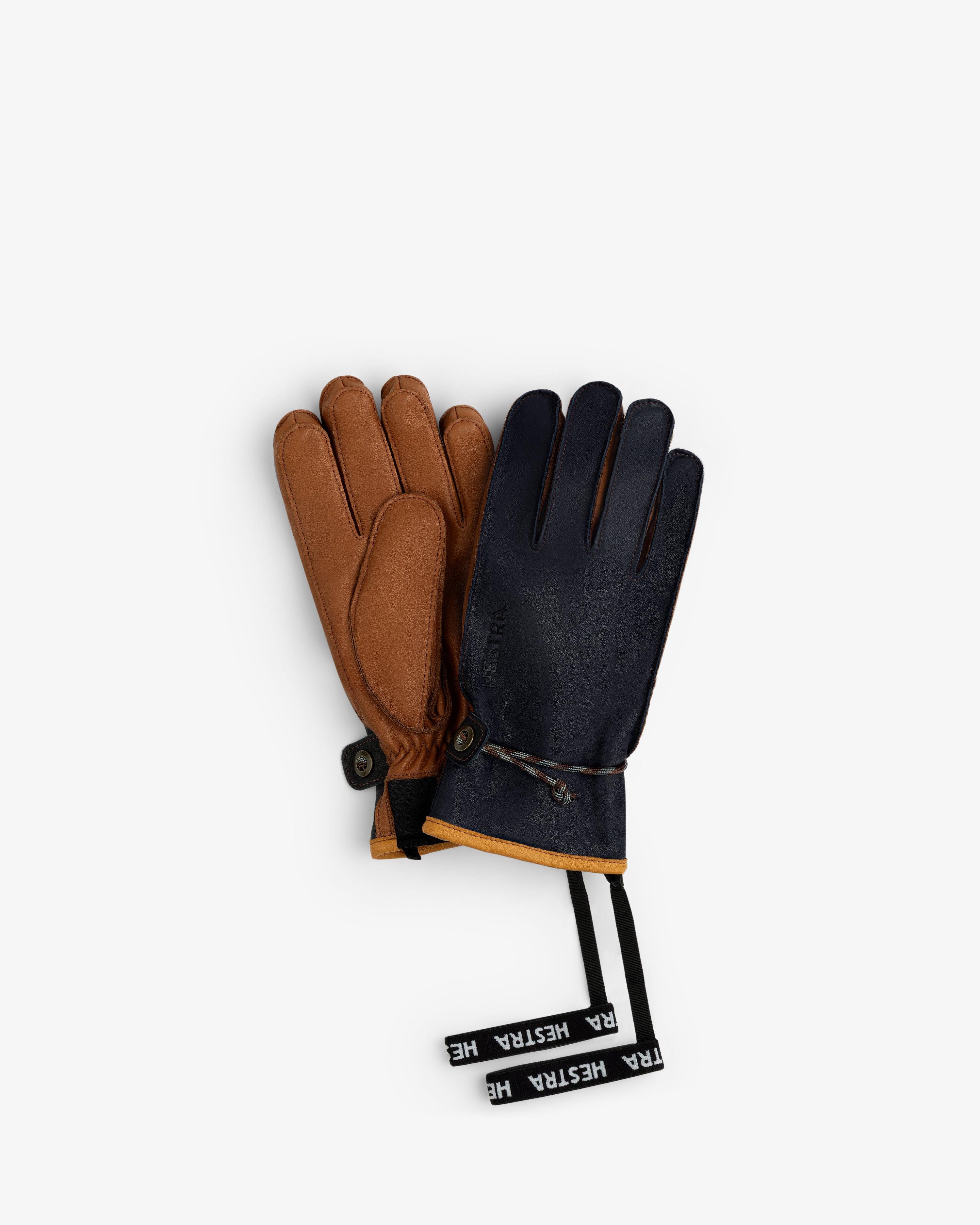 Wakayama Gloves in brown and navy blue, featuring adjustable wrist cords and branded pull tabs.