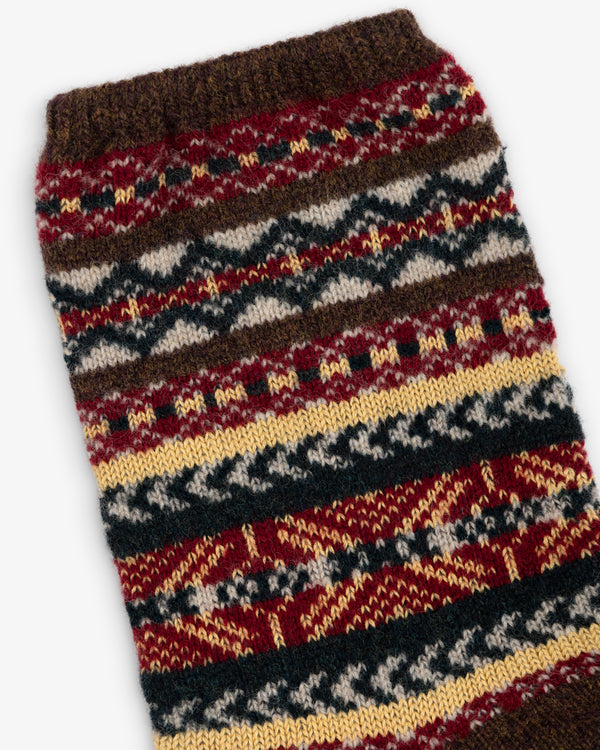 Fair Isle Quarter Sock with a multicolored Fair Isle knit pattern in shades of brown, red, yellow, and cream.
