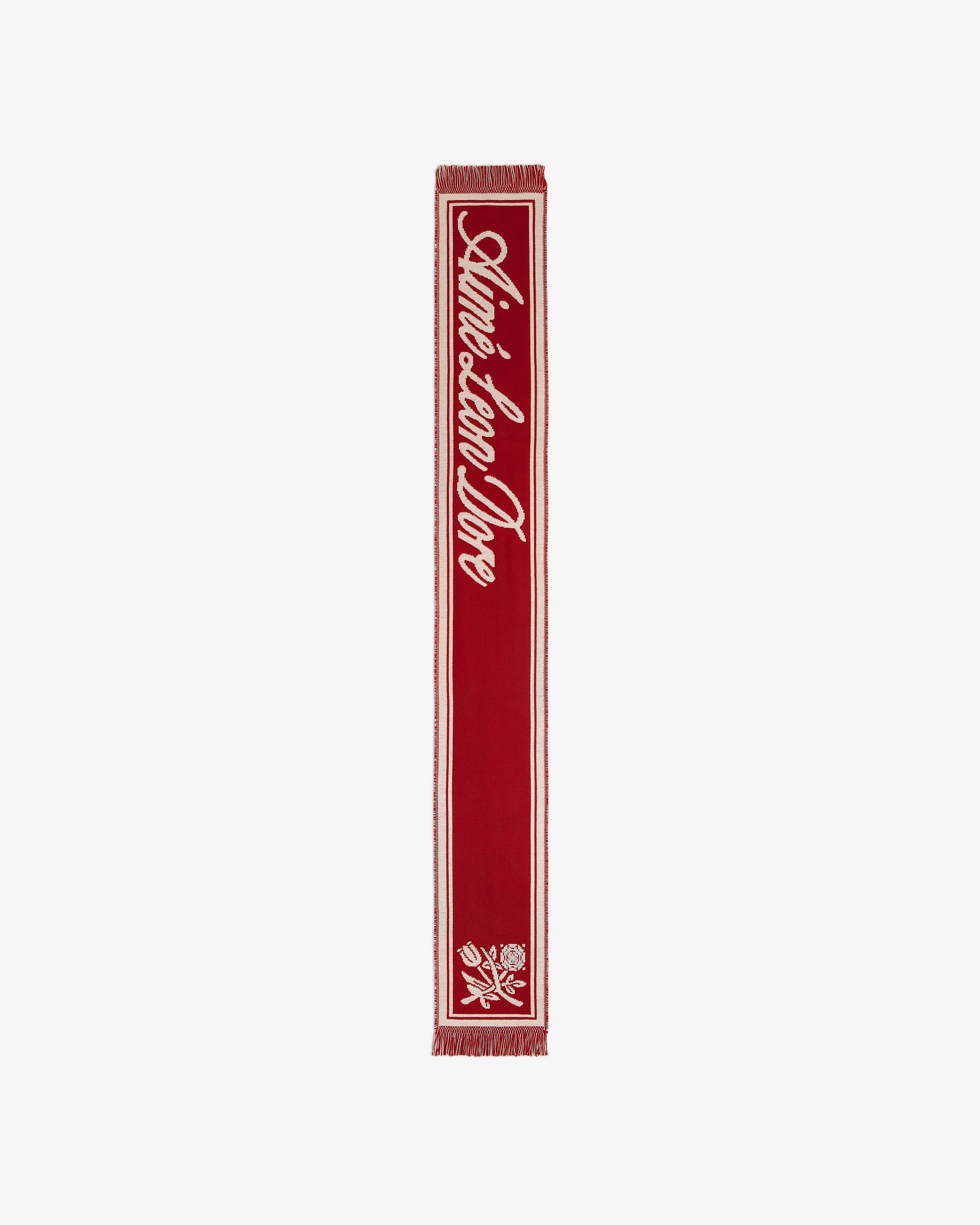 Red Wool Script Scarf featuring white script text and a floral graphic at the base.