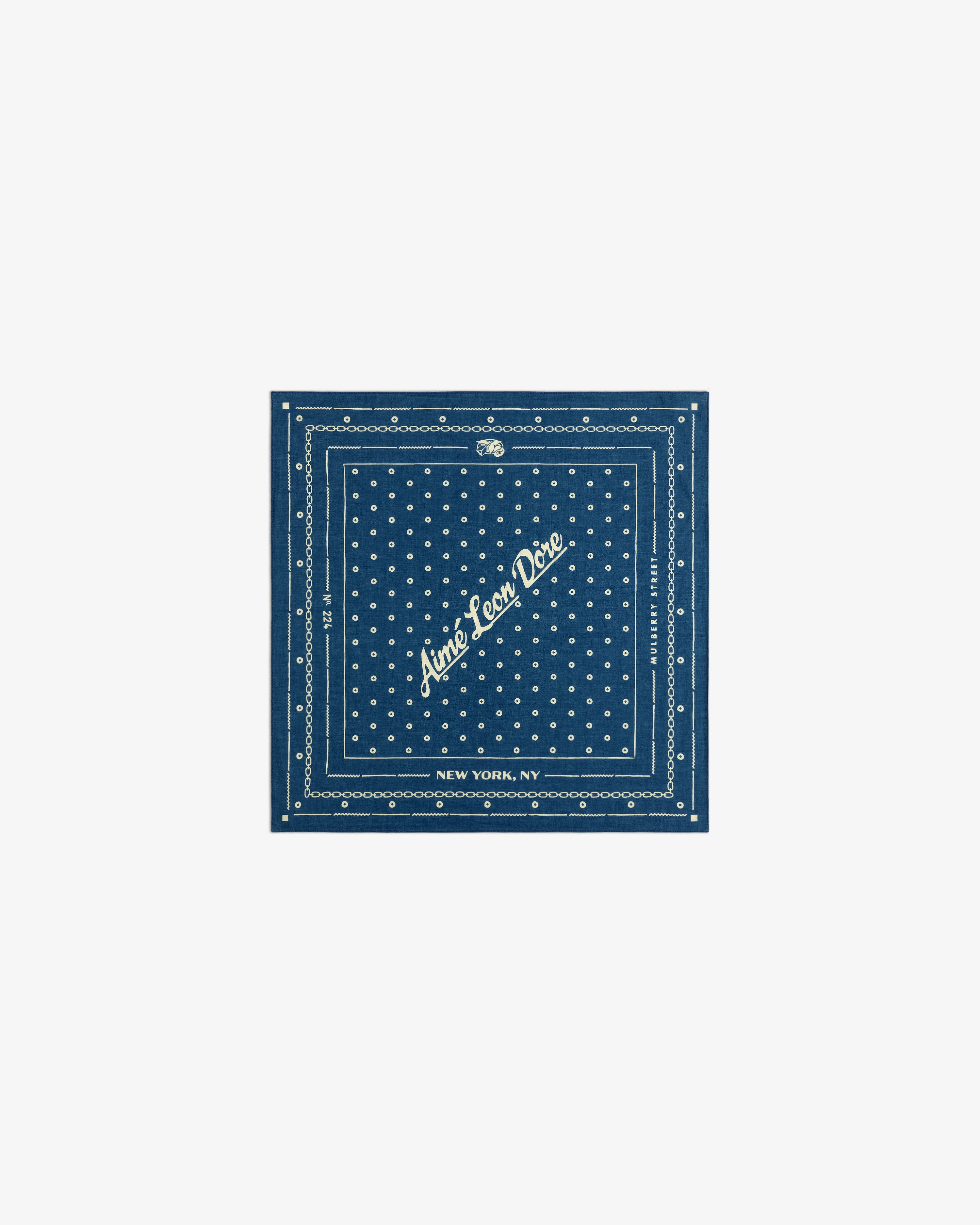 Indigo Dyed Cotton Bandana in dark blue with white polka dots and Aimé Leon Dore, New York, NY text.