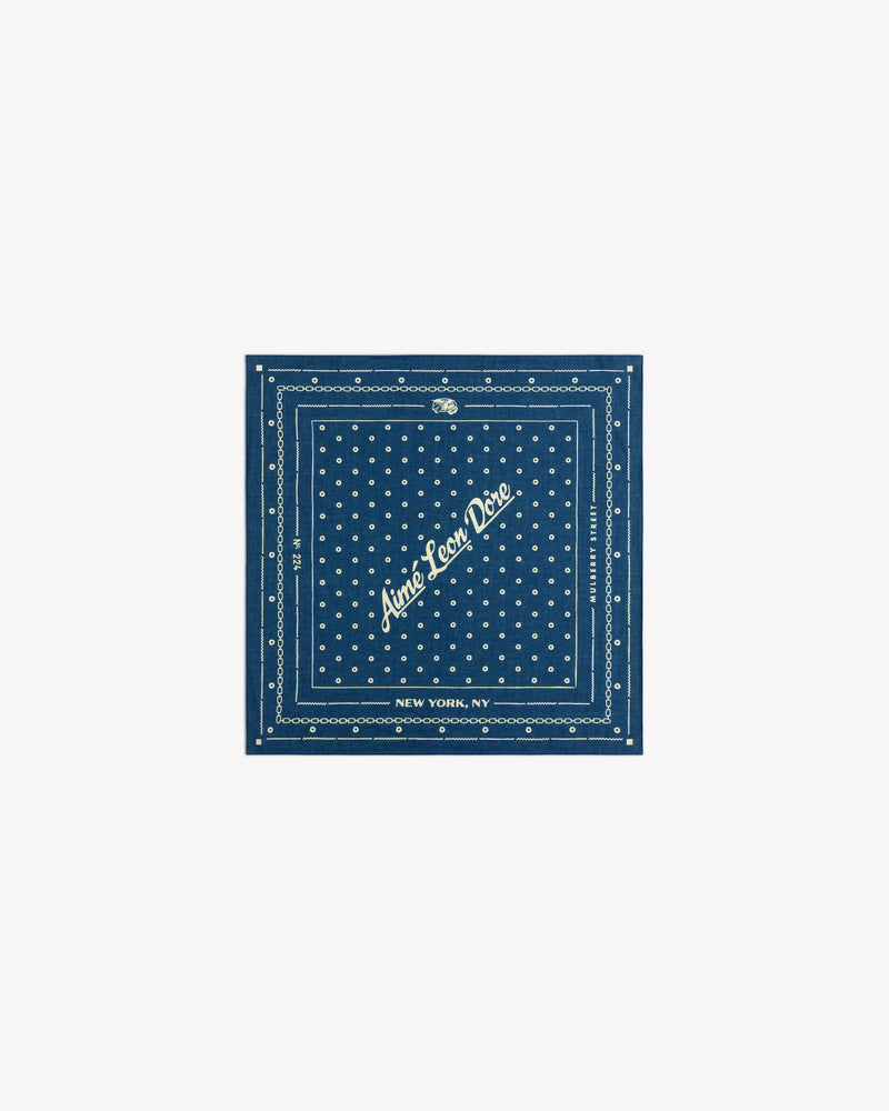 Indigo Dyed Cotton Bandana in dark blue with white polka dots and Aimé Leon Dore, New York, NY text.