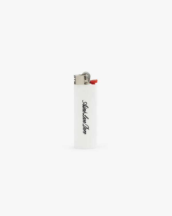 Caricature Lighter: white with black cursive print, red button, shown upright on a plain white background.