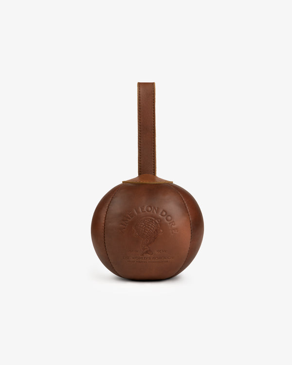 Atlas Vintage Leather 10 Lb Kettle Bell in brown leather with a top handle and embossed circular emblem.