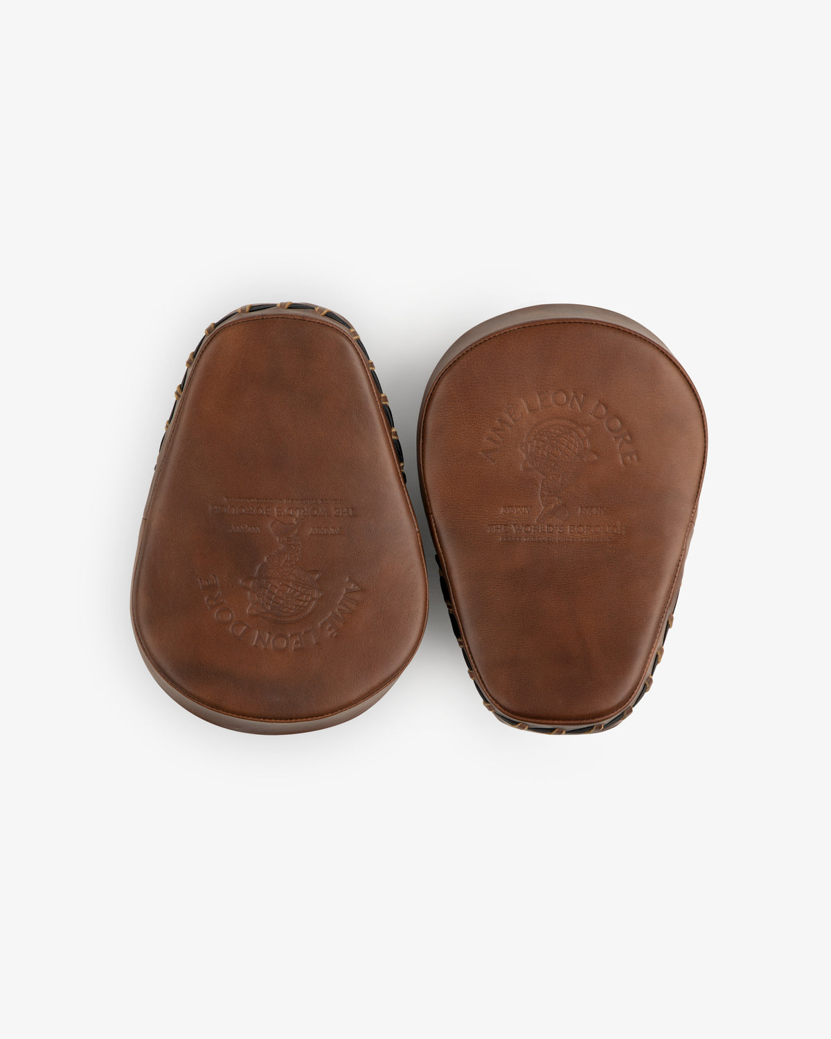 Atlas Vintage Leather Boxing Pads: two brown leather pads with embossed logo details.