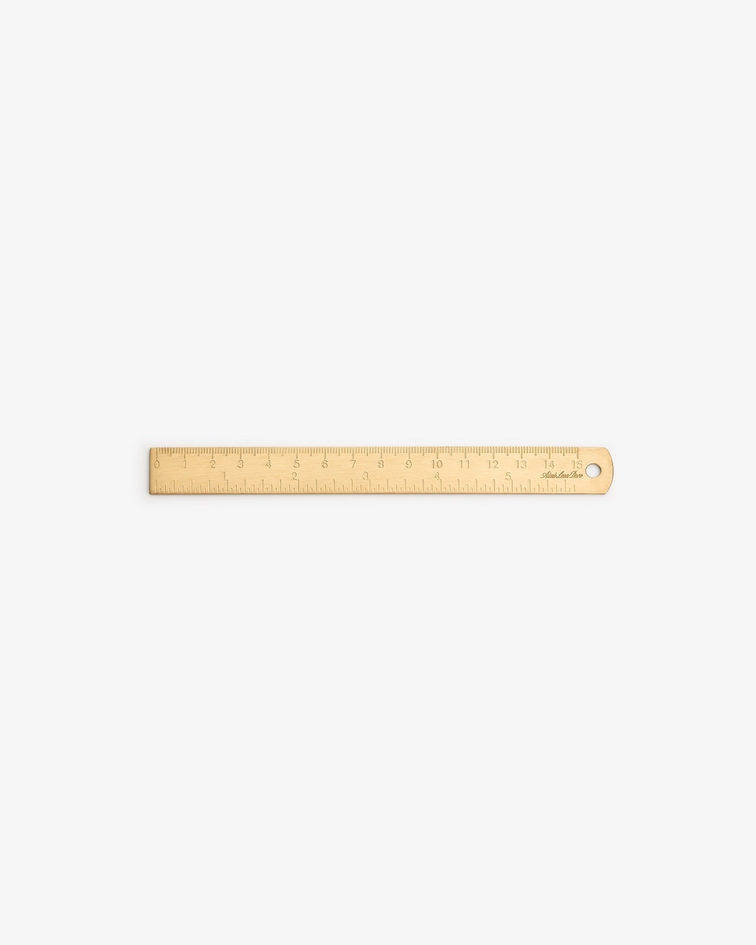Brass Measurement Kit with clear markings and a hanging hole, shown on a white background.