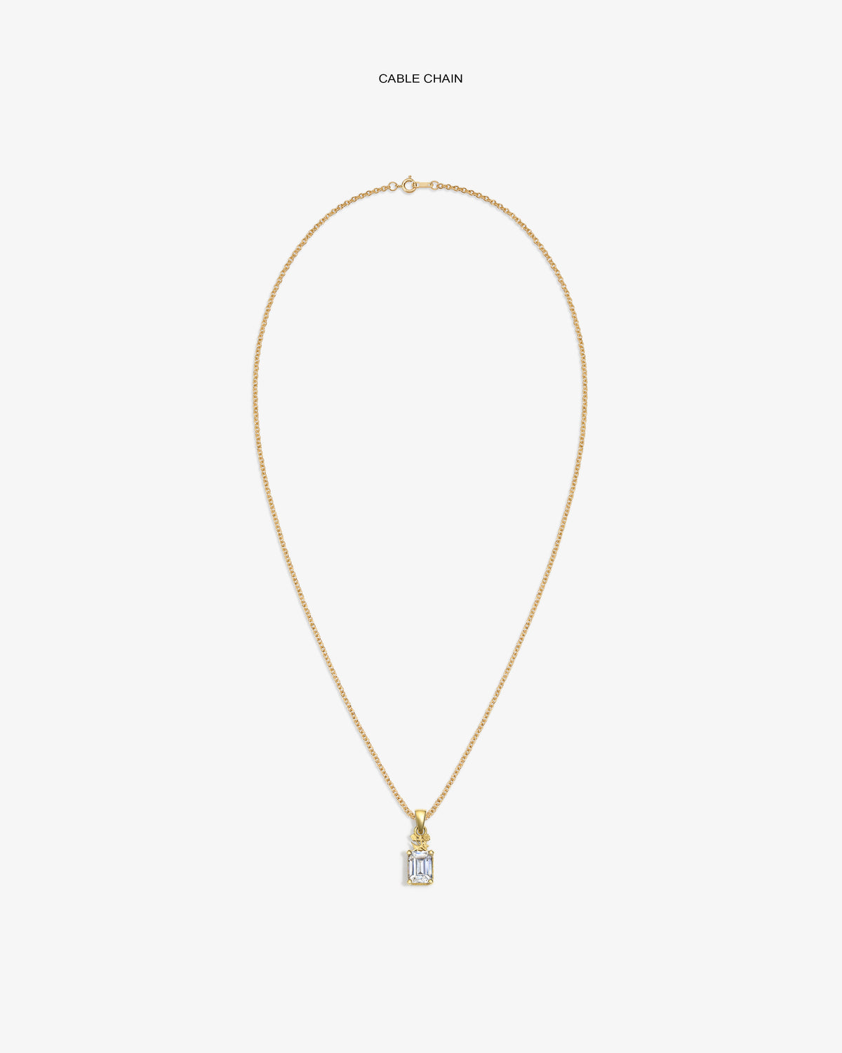 14Kt Gold Crest Gemstone Pendant on a cable chain, featuring a rectangular clear stone, shown on a white background.