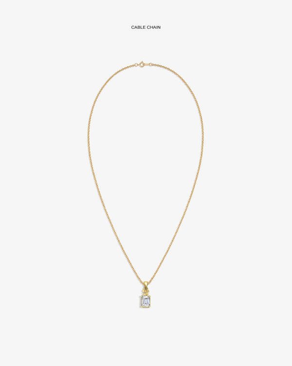 14Kt Gold Crest Gemstone Pendant on a cable chain, featuring a rectangular clear stone, shown on a white background.