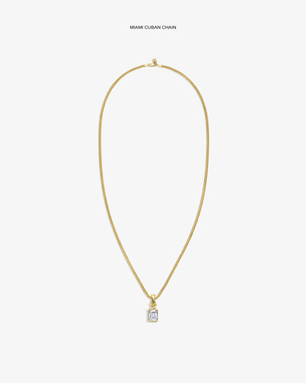 14Kt Gold Crest Gemstone Pendant Miami Cuban chain necklace on a plain white background.