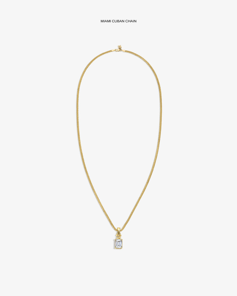 14Kt Gold Crest Gemstone Pendant Miami Cuban chain necklace on a plain white background.