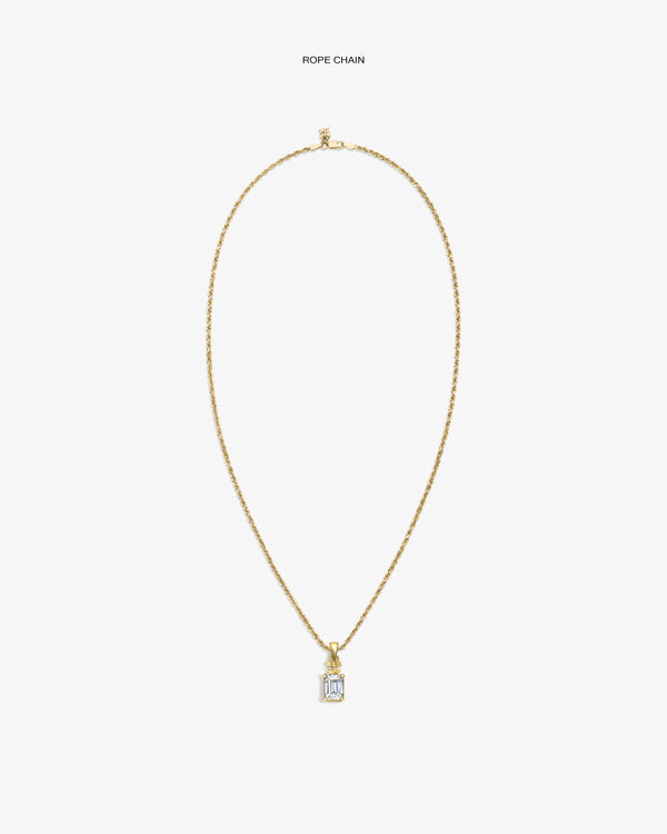 14Kt Gold Crest Gemstone Pendant on rope chain, rectangular with clear gem, shown against a white background.