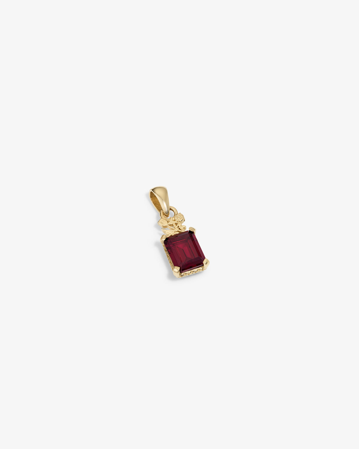 14Kt Gold Crest Pendant featuring a rectangular red gemstone and decorative top detail, on a white background.