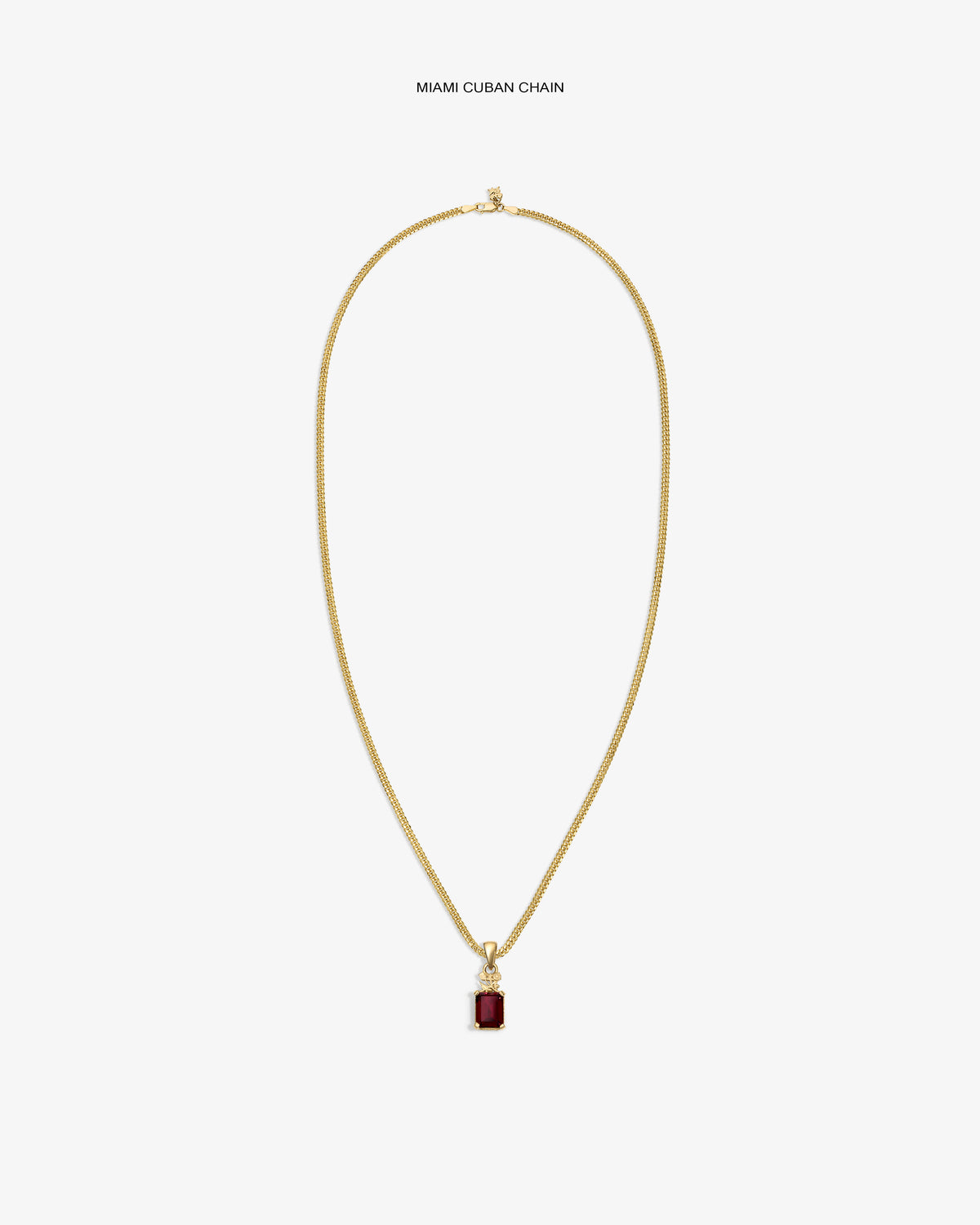 14Kt Gold Crest Gemstone Pendant necklace with a red stone, shown on a white background.