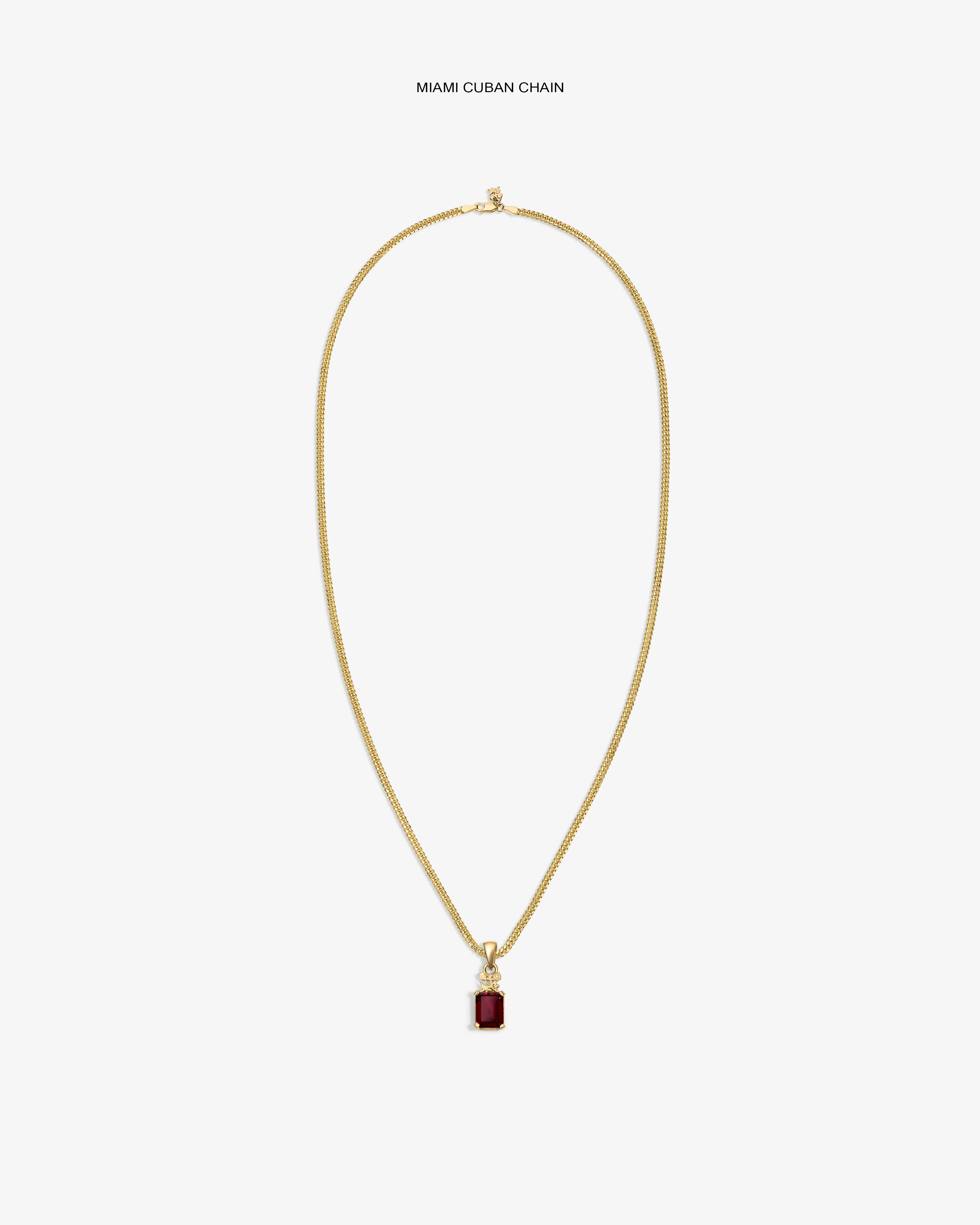 14Kt Gold Crest Gemstone Pendant necklace with a red stone, shown on a white background.