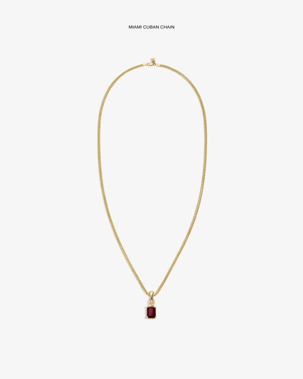 14Kt Gold Crest Gemstone Pendant necklace with a red stone, shown on a white background.