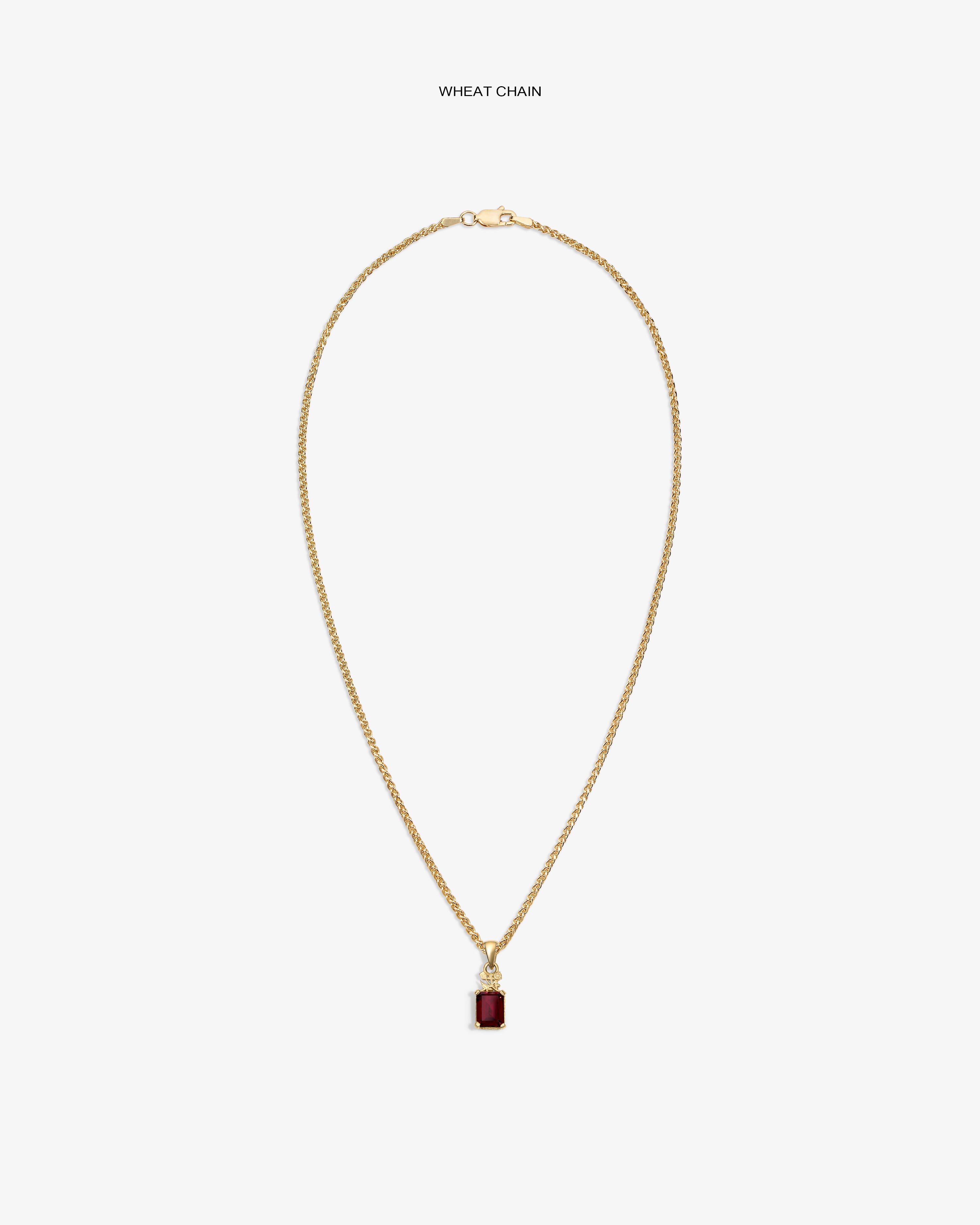 14Kt Gold Crest Gemstone Pendant on wheat chain, featuring a rectangular red stone, shown on a white background.