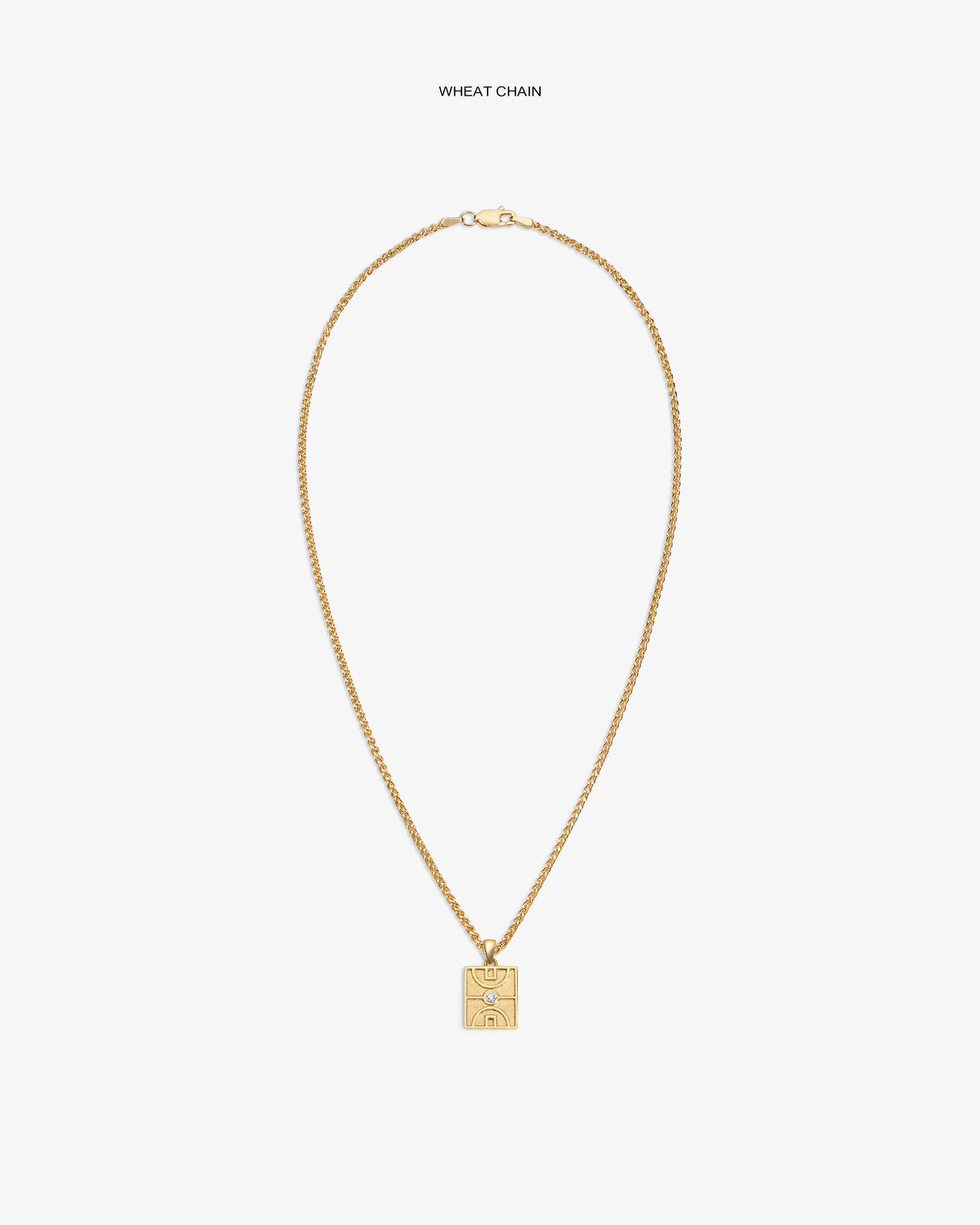 14Kt Gold Diamond Court Pendant on a wheat chain, featuring an engraved abstract face, set against a white background.