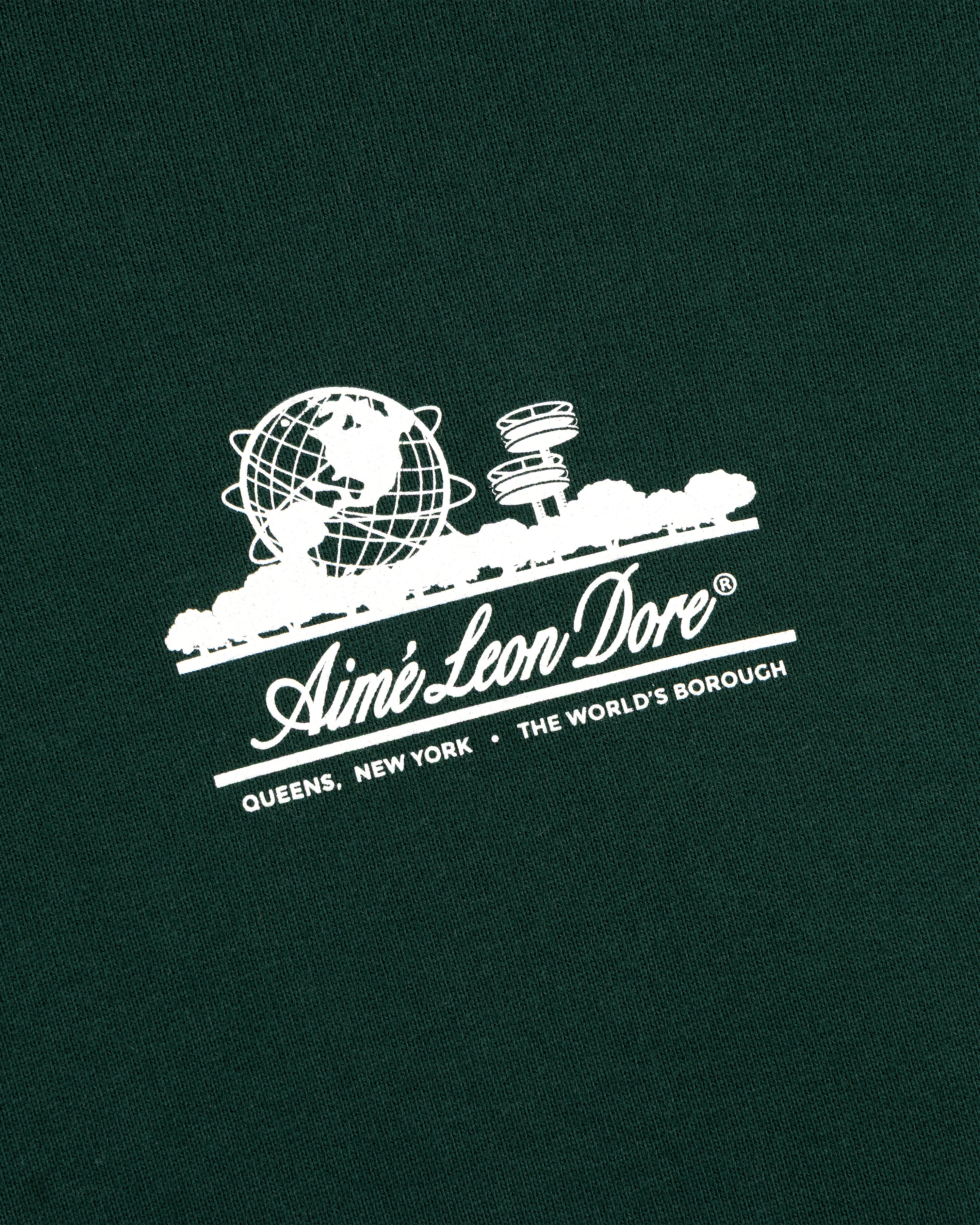 White Unisphere globe and Aimé Leon Dore Queens NY text on green Unisphere Waffle Lined Full-Zip Hoodie.