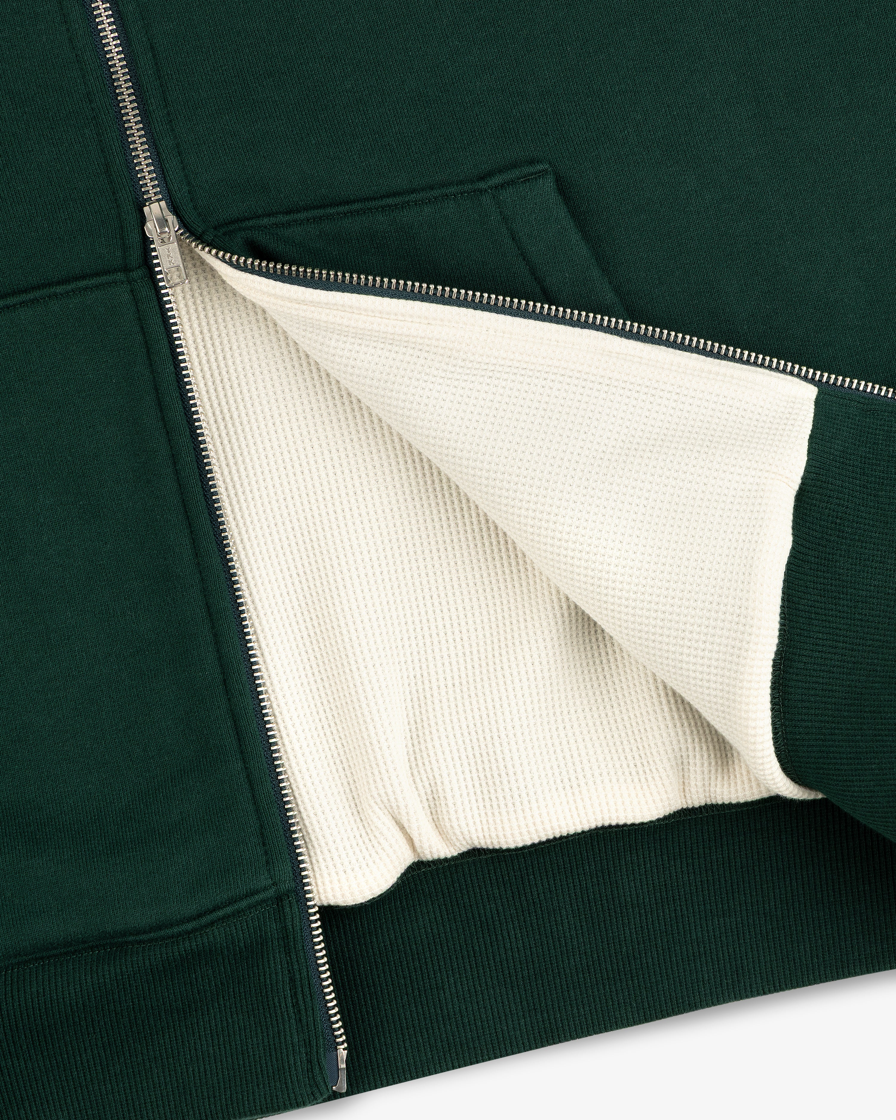 Unisphere Waffle Lined Full-Zip Hoodie unzipped, showing its textured cream waffle inner lining.