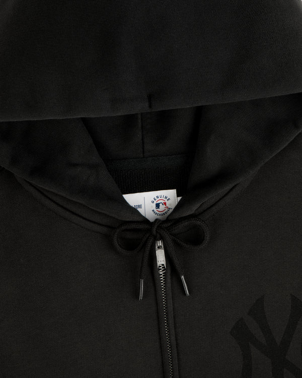 Yankees Washed Full-Zip Hoodie with drawstrings tied in a bow and visible collar tag.