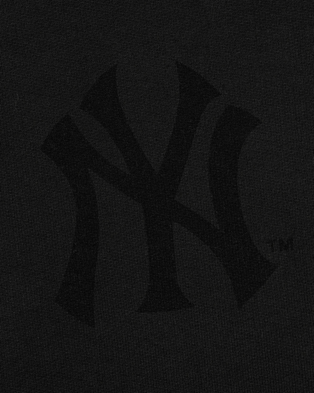 Yankees Washed Full-Zip Hoodie in black with a subtle dark Yankees logo centered on the front.
