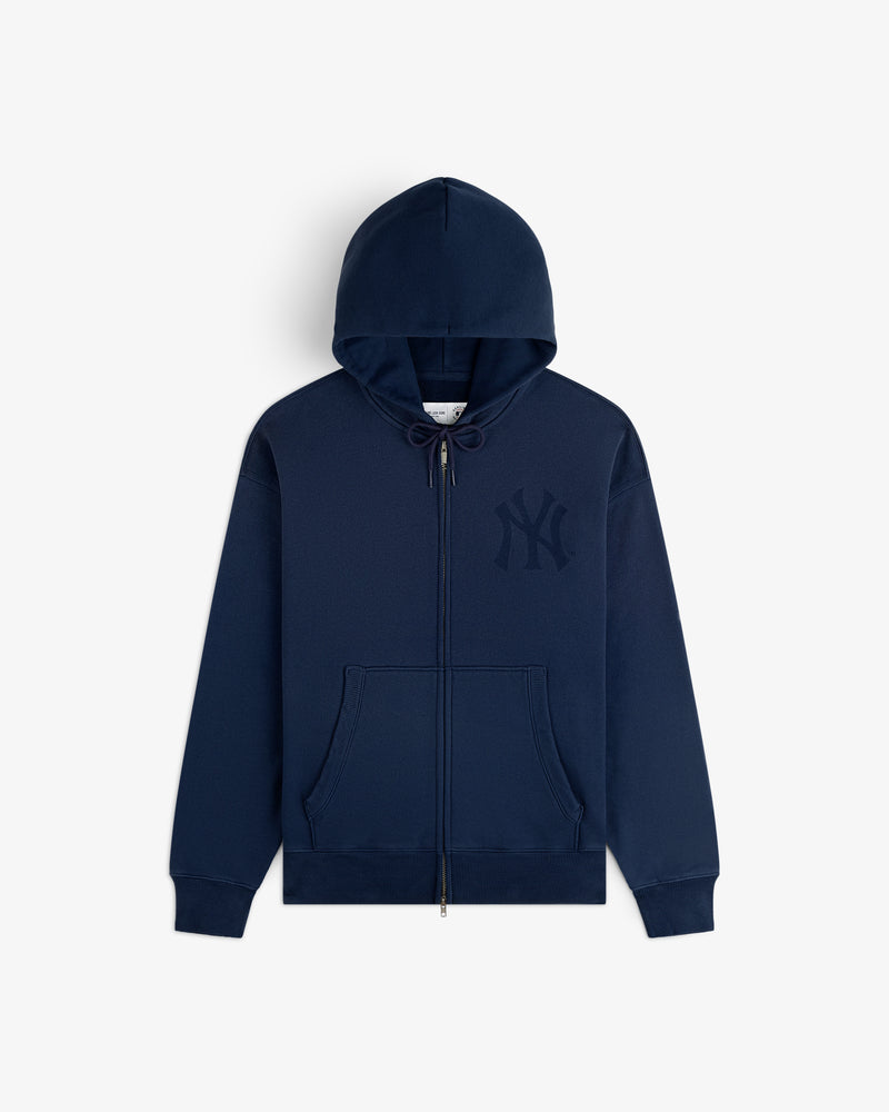 Yankees Washed Full-Zip Hoodie in navy blue with front pockets and a subtle NY Yankees logo on the chest.
