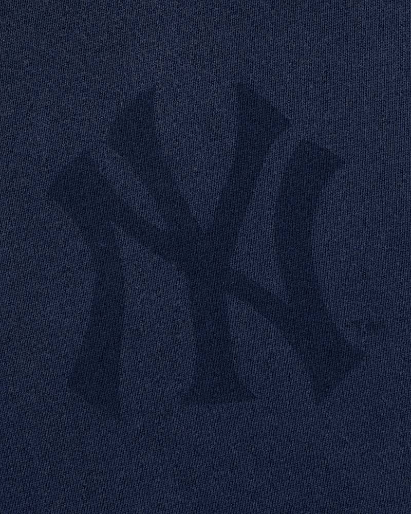 Dark blue Yankees Washed Full-Zip Hoodie with a subtle, large woven New York Yankees logo pattern.