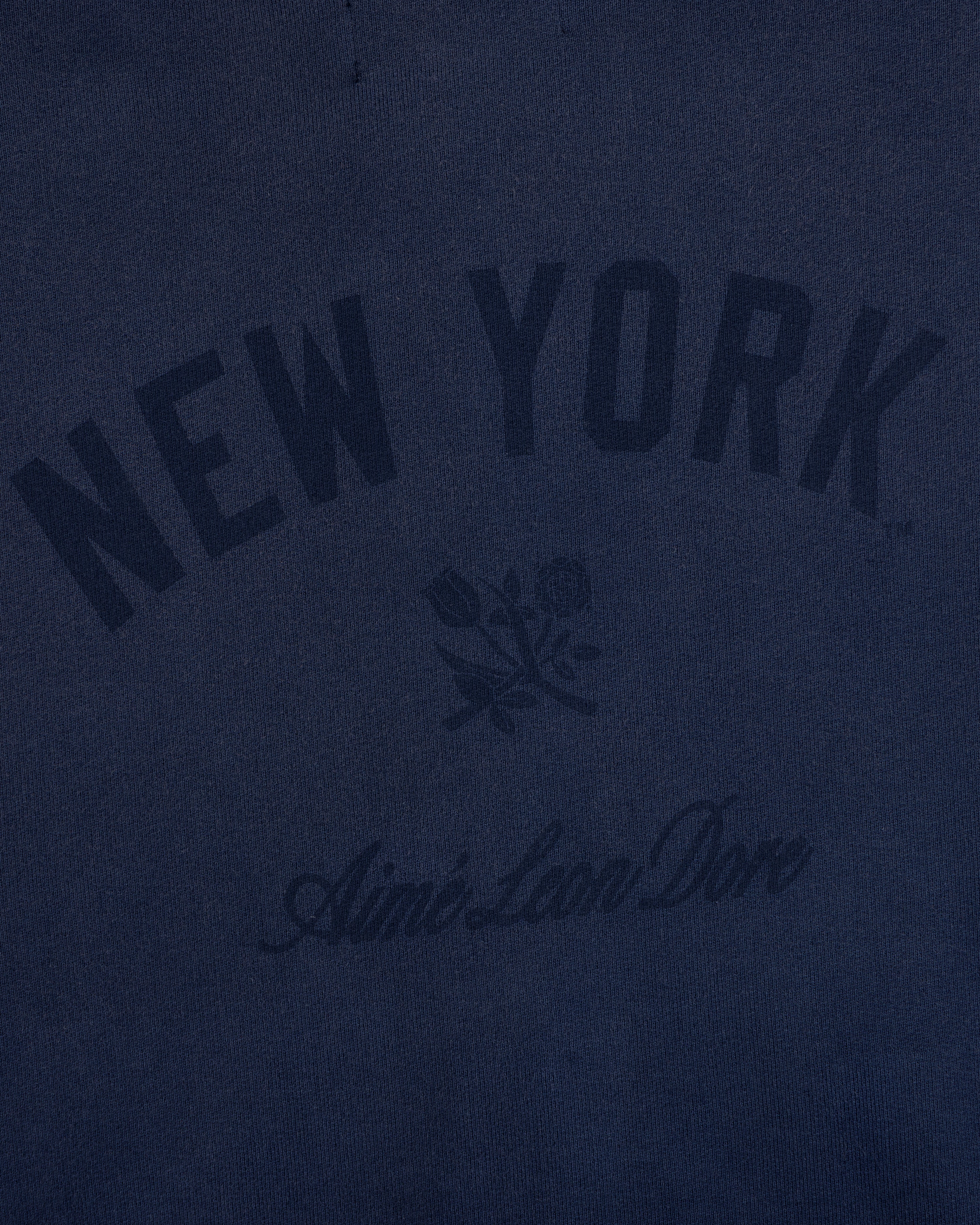 Navy Yankees Washed Full-Zip Hoodie with NEW YORK, rose graphic, and Aimé Leon Dore below.