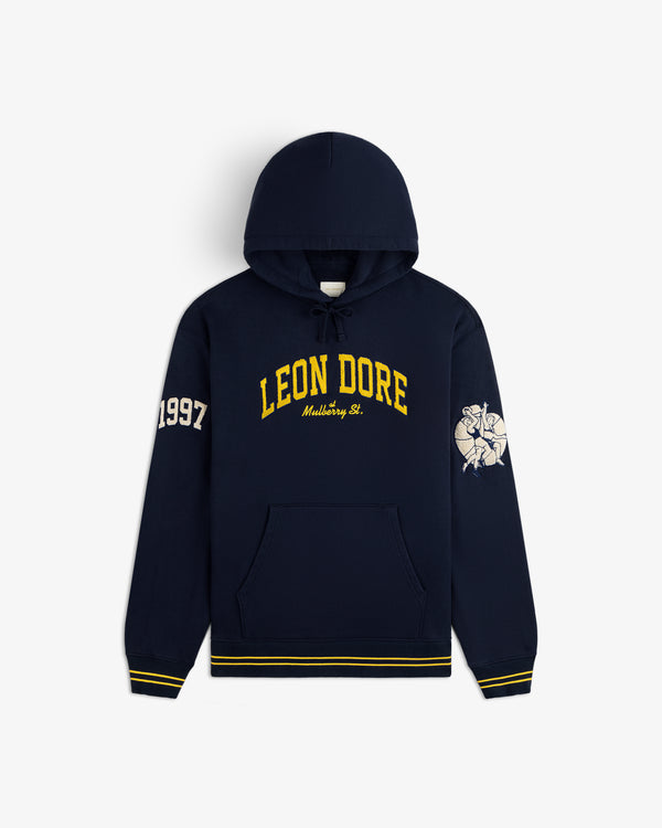 Mulberry Letterman Hoodie: navy, LEON DORE Mulberry St. text, yellow accents, 1997 sleeve, arm graphic.