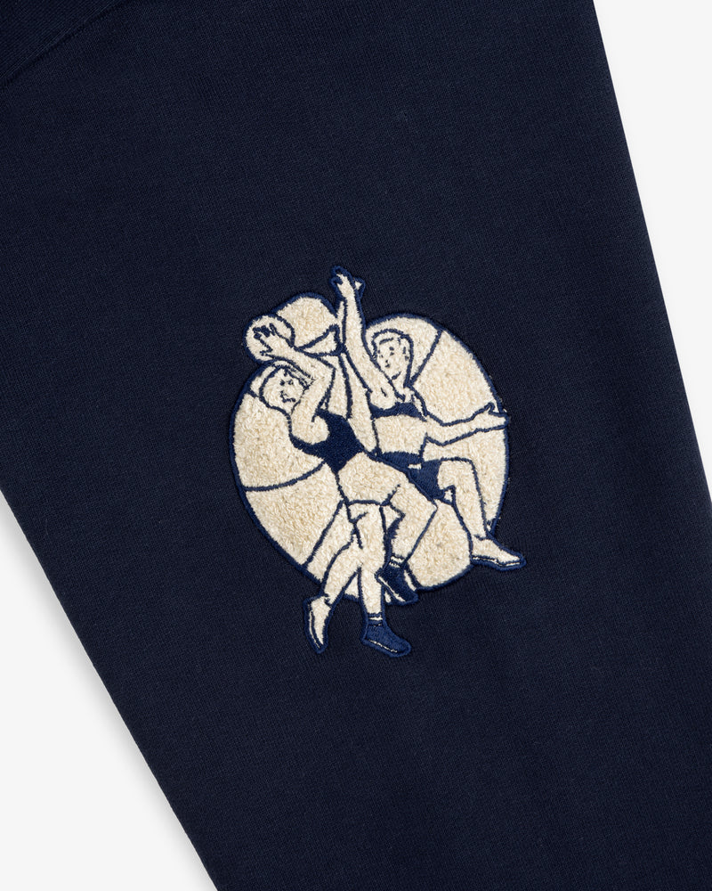 Two athletic figures are embroidered on the Mulberry Letterman Hoodie, set against a circular light background.
