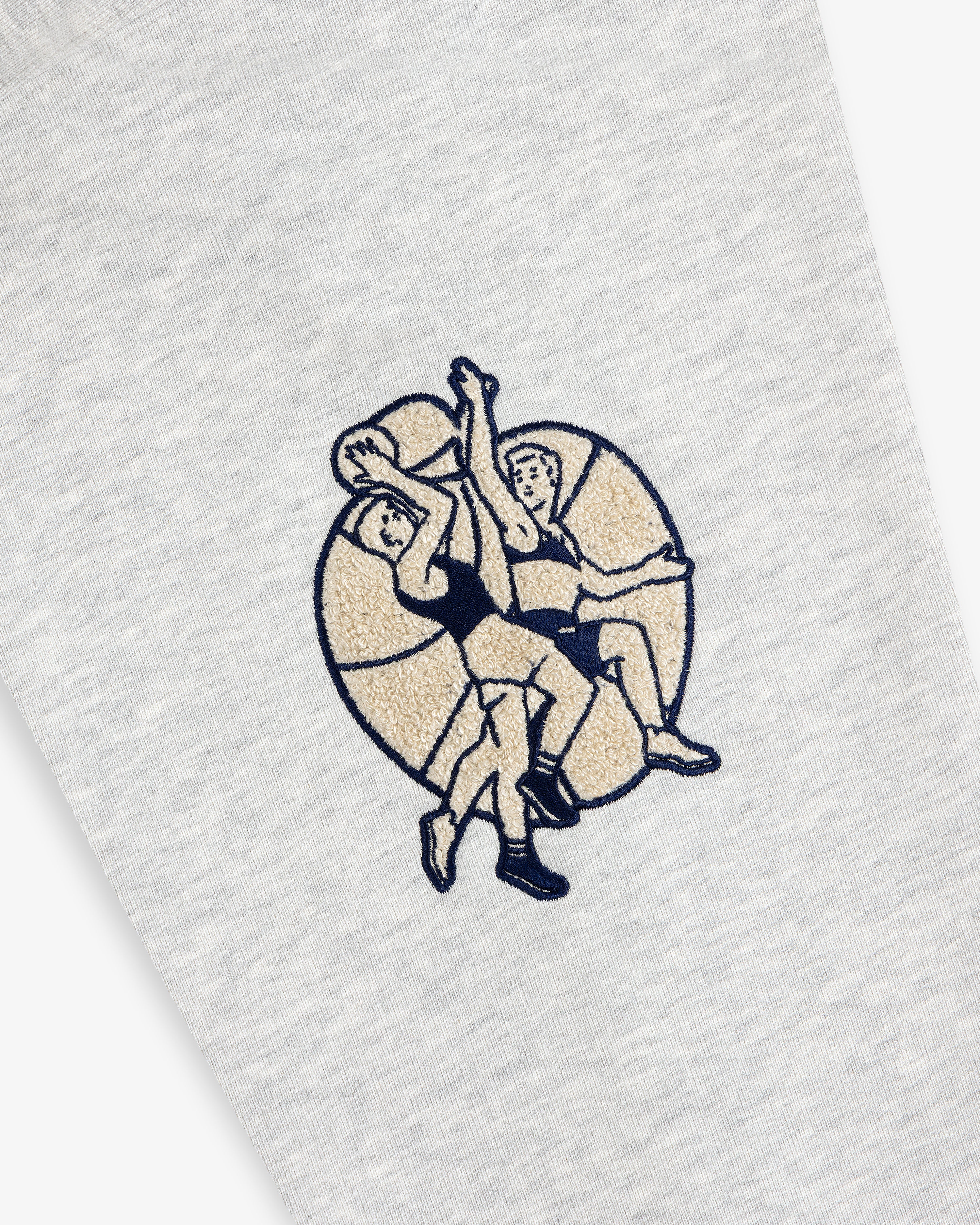 Two cartoon basketball players jump for a ball on a large basketball, printed on gray Mulberry Letterman Hoodie.